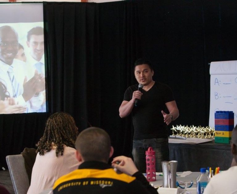 JT Tran teaching a room of students